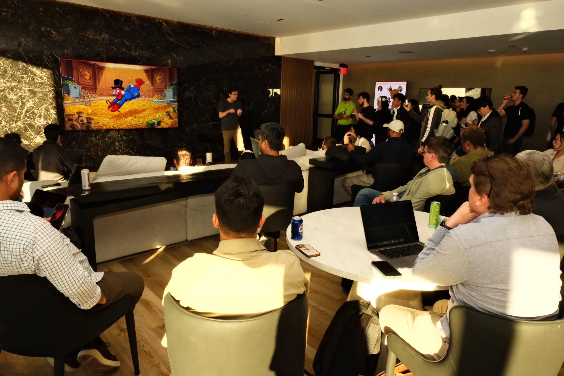 Andrew Smith presenting to the crowd at The Penthouse Heist